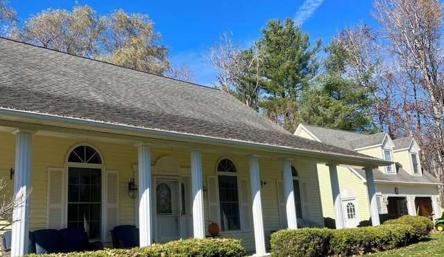 3-bedroom house in serene Lanesborough with gym, hot tub, and wrap around porch