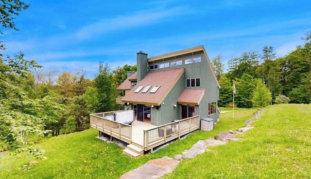 3-story secluded home with private sauna, hot tub, pond on-site