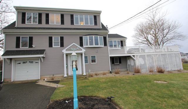 32 Tupper Ave- Modern home, .3 miles to the beach, water views, central location
