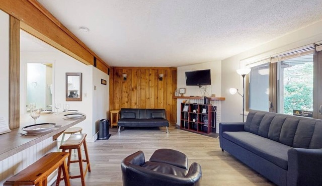 All-seasons condo with on-site golf, pools, athletic courts, gym, & EV charger