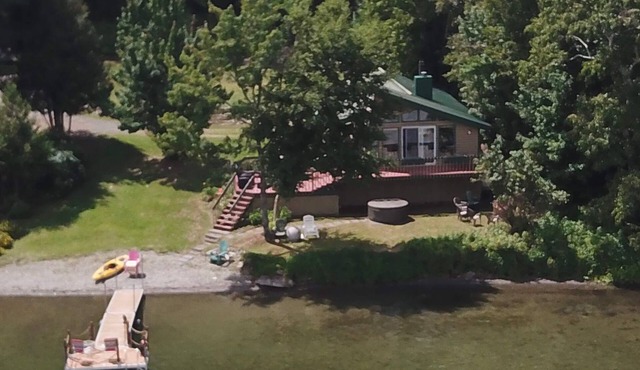 Amazing lakeside cottage, stunning view & Sunsets! in Lac-Baker