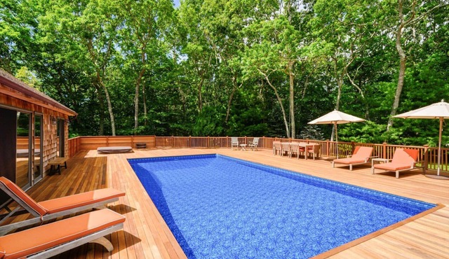 Ample Decking, Large Pool, Finished Lower Level with Full Service Gym,.