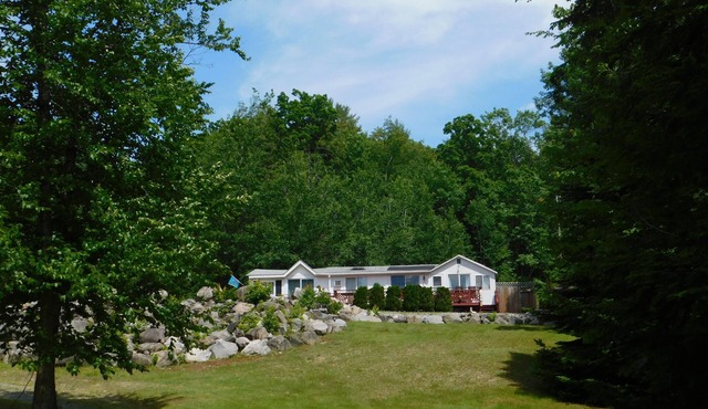 *AUGUST SPECIAL* Brandy Pond oasis w/large lawn and beautiful sandy beach!