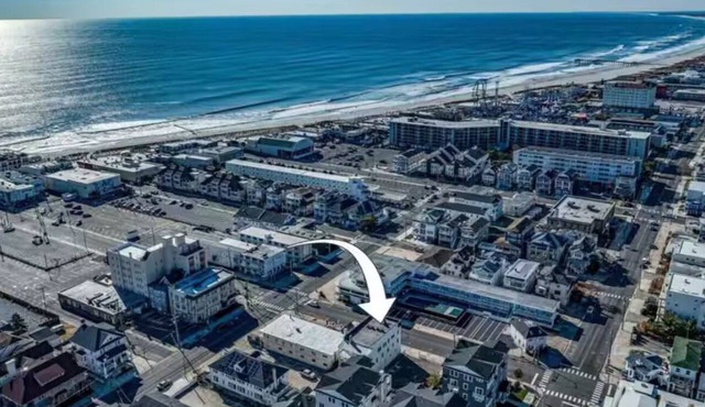 Beach Condo –Modern 2BR/2BA w/Pool, Parking, More!