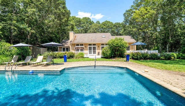 Charming East Hampton Escape with Heated Pool & Spacious Yard