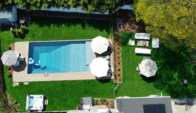 Chic Retreat: Hot Tub, Heated Pool, Sunroom