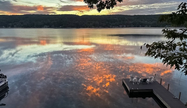 Cozy Lakefront Cottage with Porches, Dock, and Lake Views