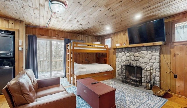 Cozy studio cabin w/seasonal mountain views, wrap-around deck, window a/c, bbq