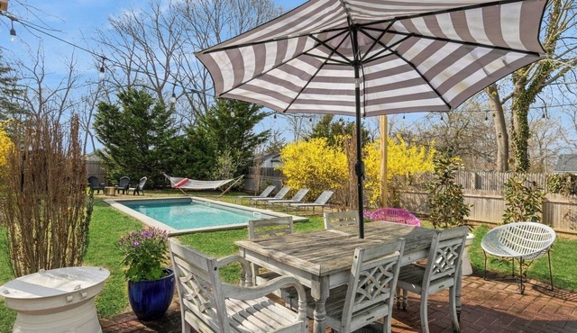 Delightful 4-bedroom Cape with heated saltwater pool in the heart of Greenport!