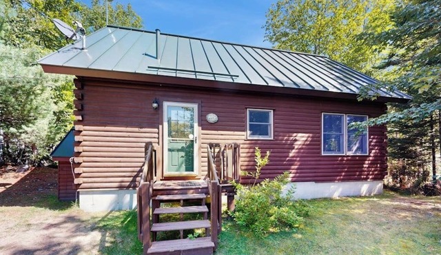 Dog-friendly lakefront home with deck, grill, WiFi, shared dock & water access