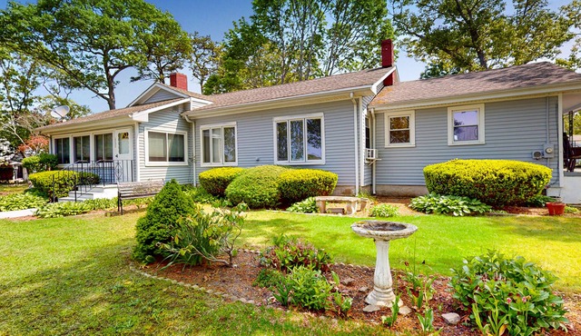 Dog-friendly, waterfront home with gorgeous bay view - walk to beaches/town