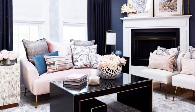 Elegant suite with a king bed, fireplace, and kitchenette.