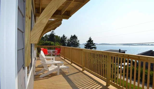 Enjoy spectacular sunset and water views from the deck and balconies with water access.