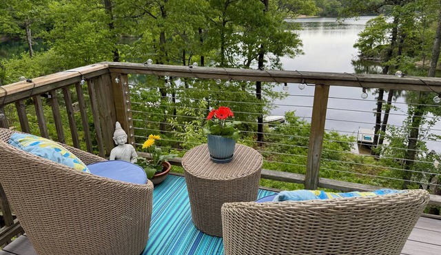 Enjoy the lake, dock, beach, large grounds, or renovated home. New ductless AC.