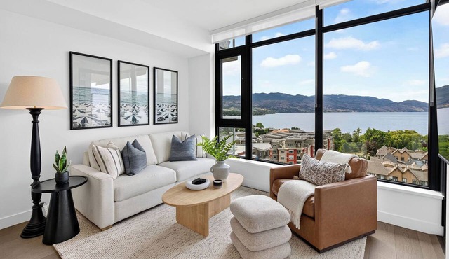 Experience luxury lakefront living at AQUA Kelowna. This elegant 1-bed retreat features a king suite & soa bed, spa-inspired bath, designer kitchen, and private patio with stunning Okanagan Lake views, plus resort pool/gym access. in Kelowna