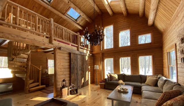 Exquisite beach front log home on Saco River