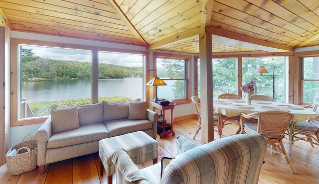 Lakefront home with firepit, yard, dock/water access, outdoor area, & W/D