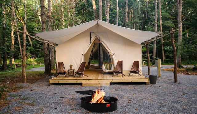 Luxury Group Safari Tent Complete with Firepit and Patio, Perfect for a Weekend Escape to the Adirondacks