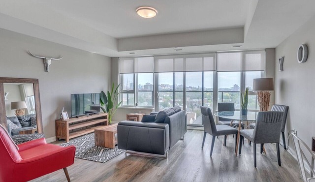 Modern 1BD+Den Suite w/Private Terrace, Gym & Parking | Near Civic Hospital