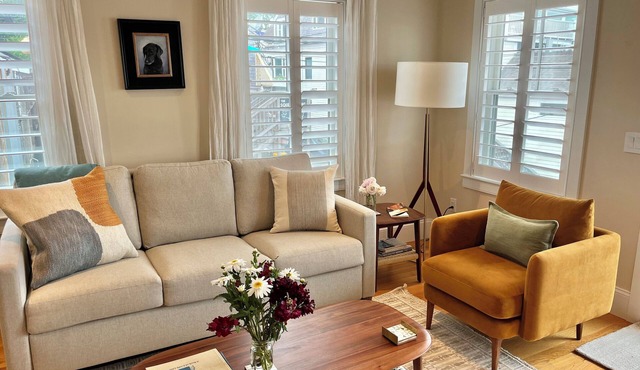 Modern beachfront condo with private deck, harbor views, and parking!