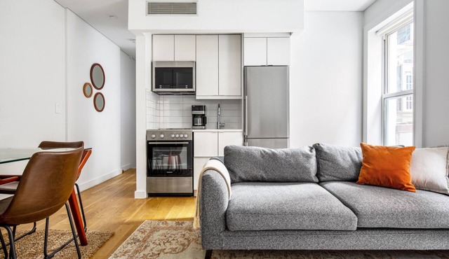 Modern Nolita 2BR w/W/D, large deck, easy walk to SoHo, by Blueground