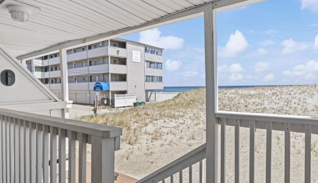 On the Beach-Dog Friendly 2BR Condo walk to the waves.