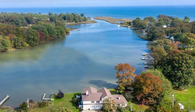 Pristine Waterfront Home with Expansive Views.