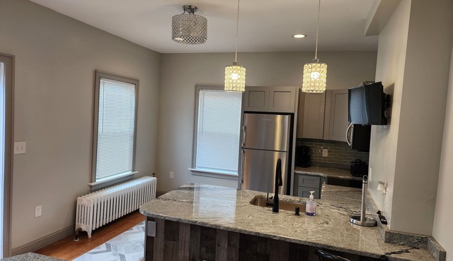 Private furnished studio. Close to hospitals, parks & commuter rail.