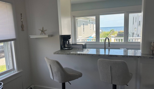 Private Rye Beach getaway with 3 bedrooms across two units, ideal for couples or families. Enjoy private beach access, ocean views, fast Wi-Fi, and walk to Petey’s Famous Seafood—steps from the sand and coastal dining.