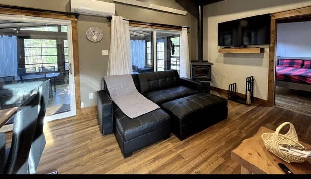 Relaxing waterfront with hot tub and game room