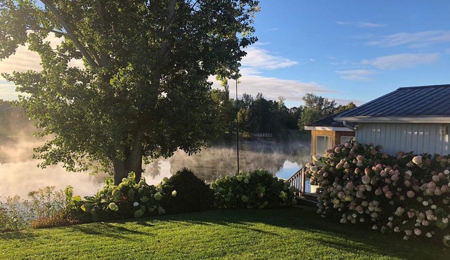 River Gem! A little piece of waterfront paradise with a cozy river home.