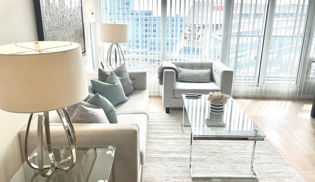 Roger’s Center- Downtown large two bedroom + den facing waterfront by CN Tower,