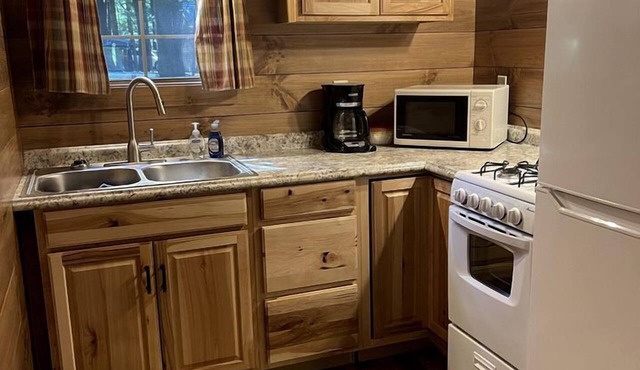 Romantic Cabin Escapes to this Charming Cook Forest Rental with Private Hot Tub in Clarington