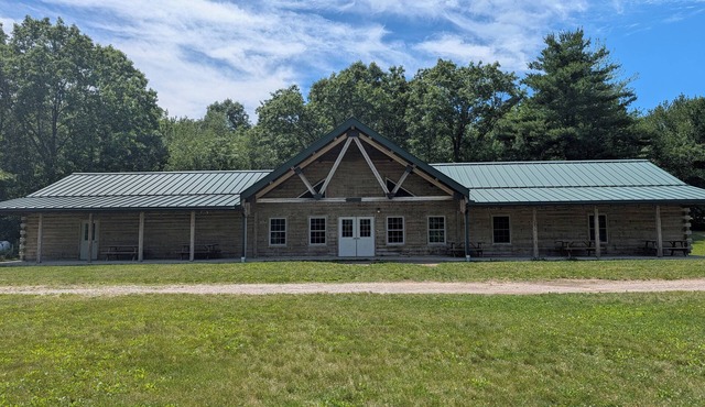 Rustic 6-bedroom cabin with private lake access in a nature camp setting