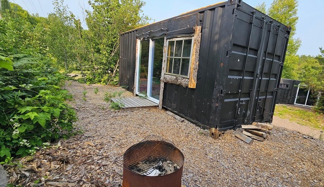Rustic shipping containers made into cozy cabins. Located U.P.'s Copper Country. in Mohawk