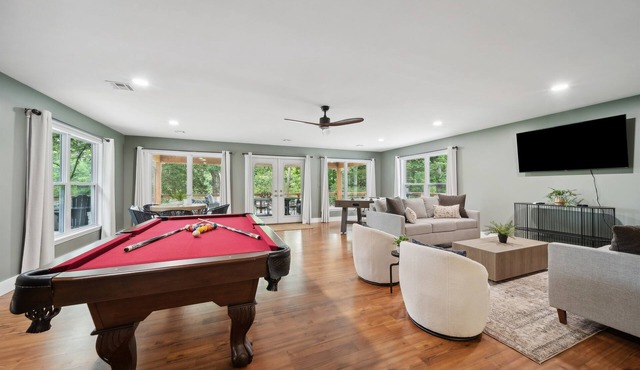 Stunning modern lakefront home, boat slip, pool table, huge deck & more! in Afton