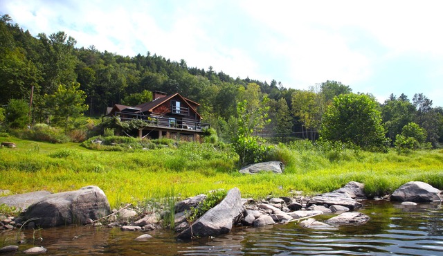 Stunning Riverfront Log Cabin With Spectacular Views