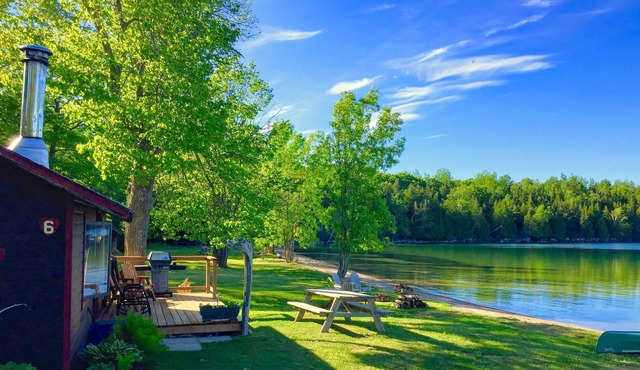 Two Bedroom Cottage on a Private Sand Beach in Long Bay, Lake Kagawong in Spring Bay