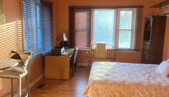 Unit B- Century Home on Trent River 2-Bedroom with private patio and garden