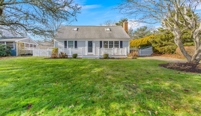 Walk to beach, fenced yard, and toys for the kids!