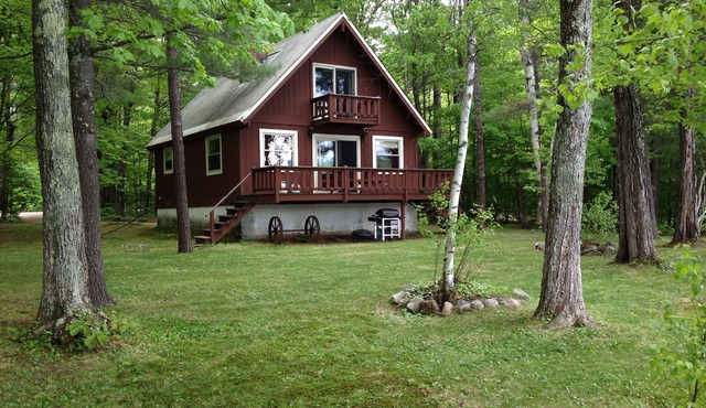Waterfront Chalet with private beach in the White Mountains of New Hampshire.