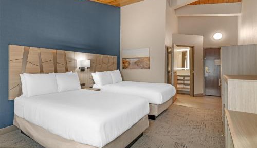 Family Suite with One King and Two Queen Beds and Sofa Bed - Non-Smoking