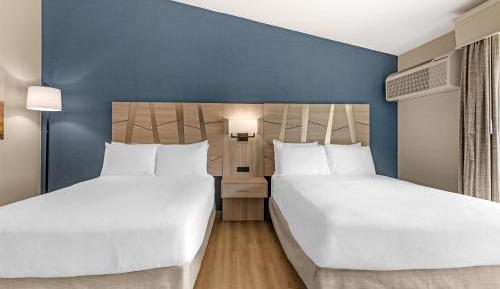 Queen Room with Two Queen Beds and Balcony - Non-Smoking