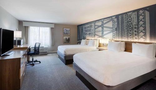 Two-Bedroom Family Queen Suite with Four Queen Beds