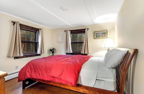 Killington House | Dog-friendly cabin with forest setting, woodstove & deck - near Killington