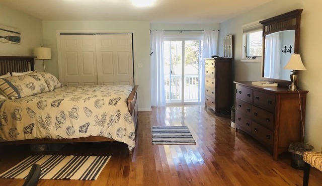 5 minutes to beautiful RI beaches! Inviting home with outdoor shower, fire pit.