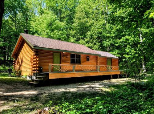 Private Riverfront Cabin with Waterfalls on the St. Regis River, New York